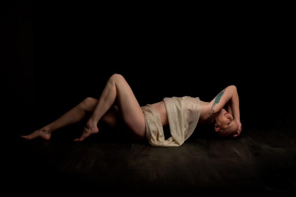 Woman guided through a signature boudoir session at The Pouting Room in Marion, Massachusetts