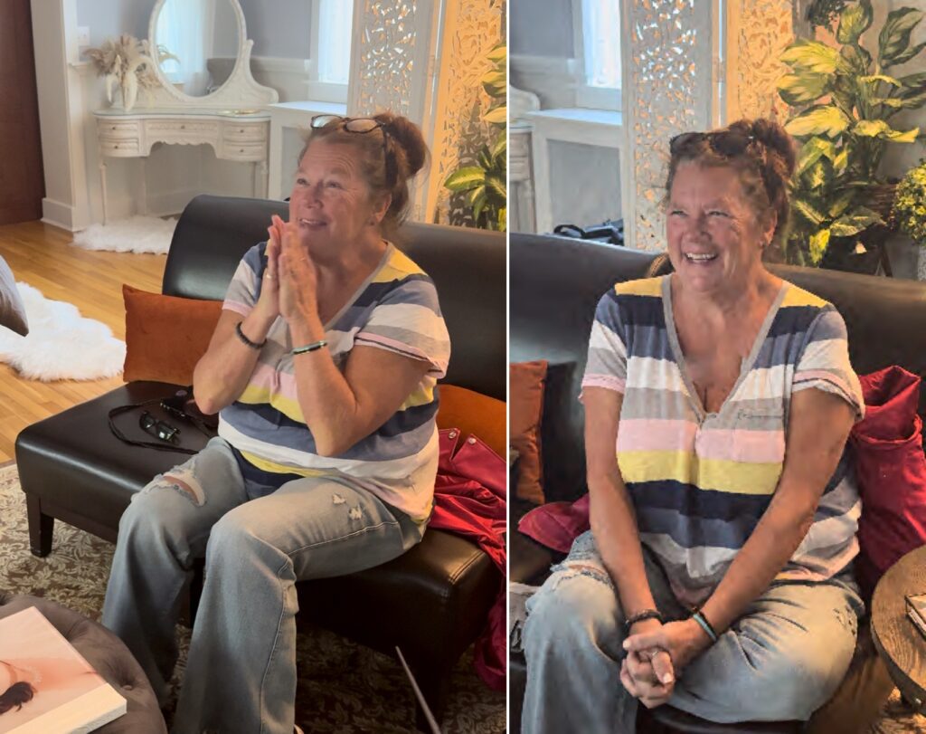 Joyful woman looking at her boudoir photographs for the first time 