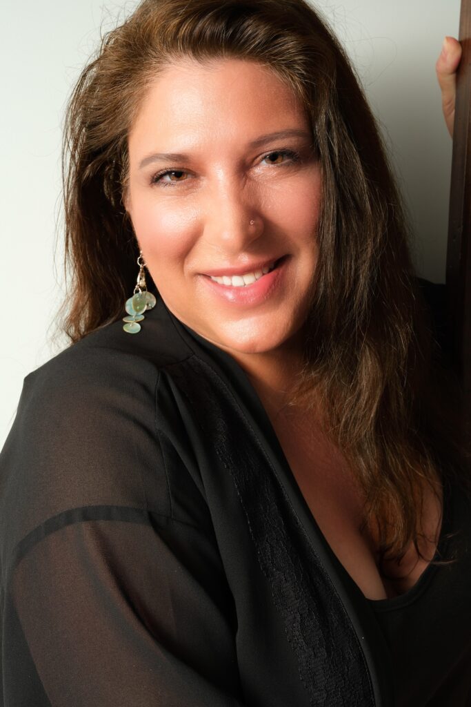 Headshot of the owner of Sacred Temple Arts, Sacha Fossa.