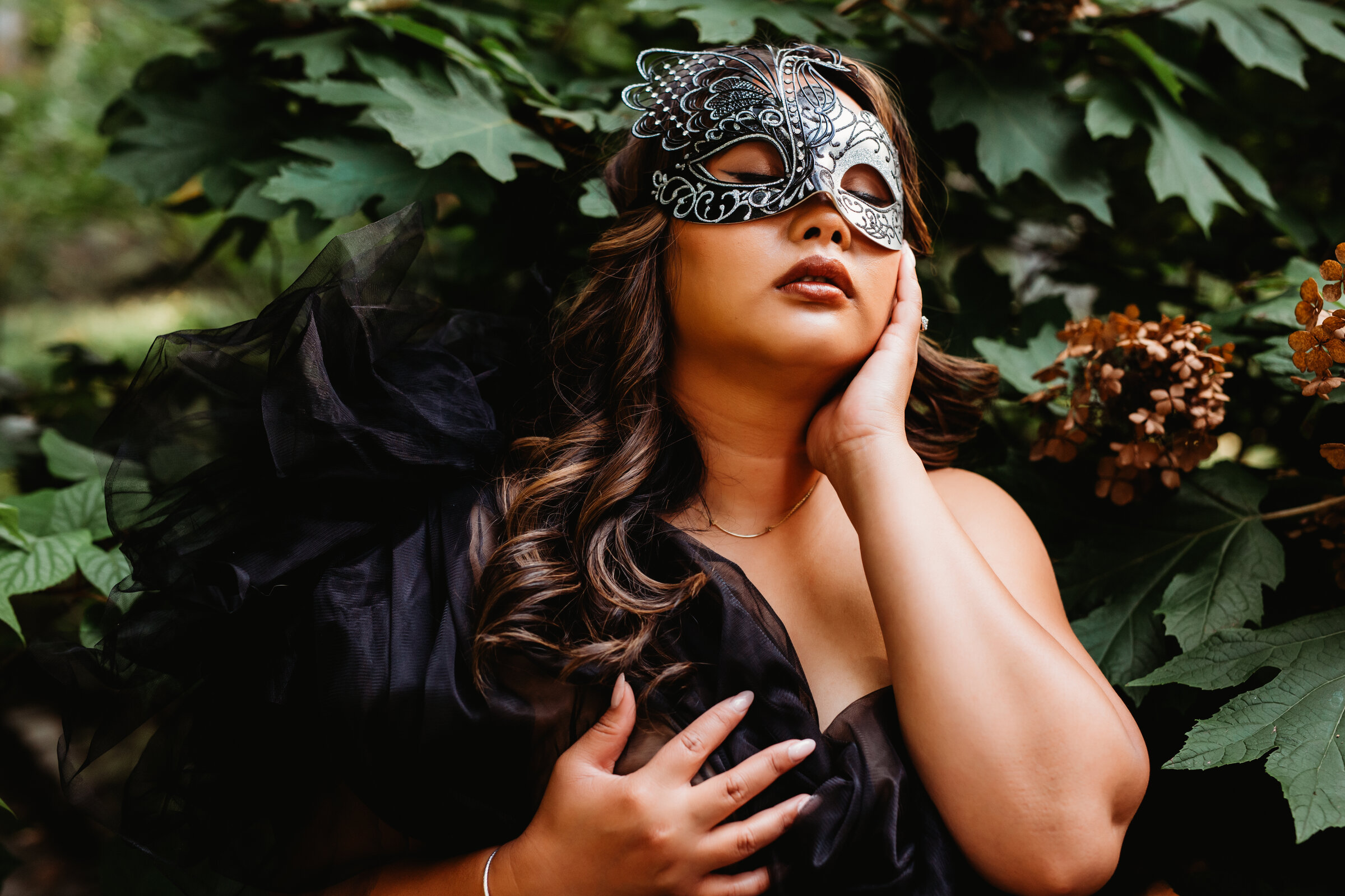 alter ego photoshoot woman wearing silver mask in garden